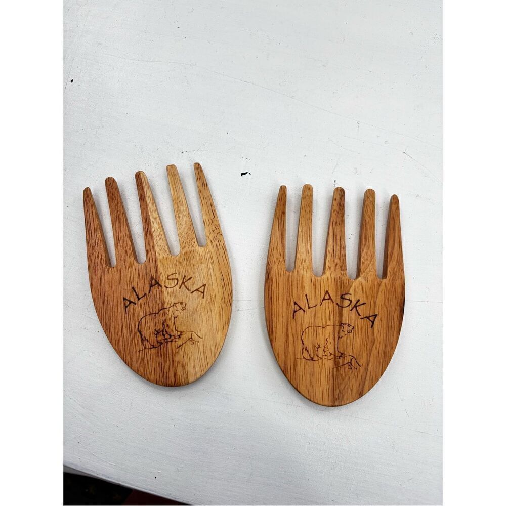 Alaska hands salad tossing forks